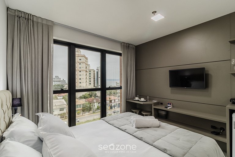 Studio vista mar 280 da praia em Itapema MHFB0503