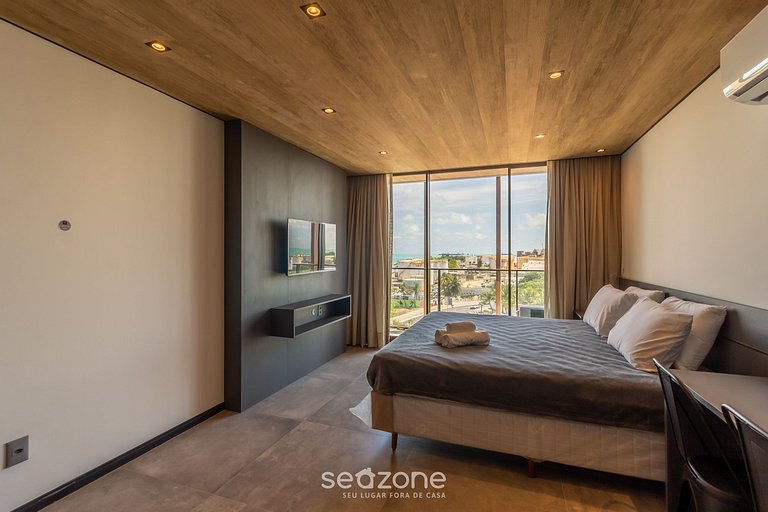 Estudio con piscina y vista lateral al mar NWT0916