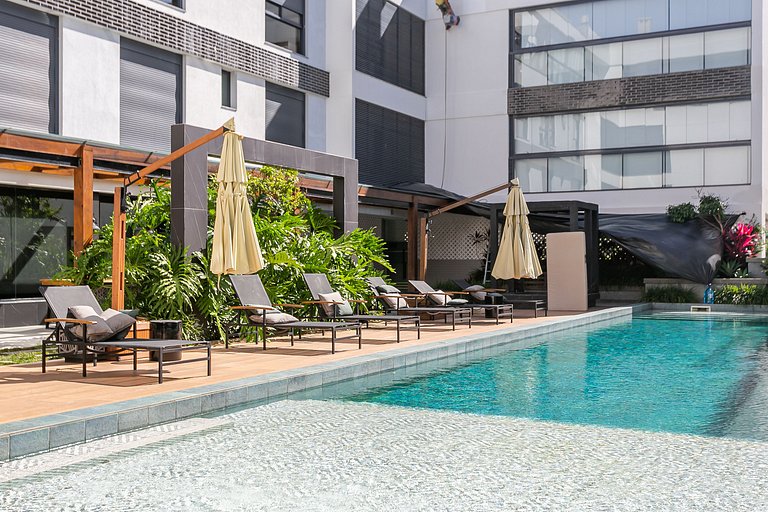 Belo studio em cond. com vista para a praia IRB203