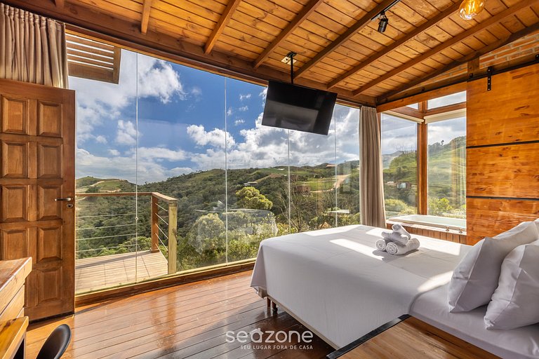 Charmosa cabana com vista incrível na serra VST005