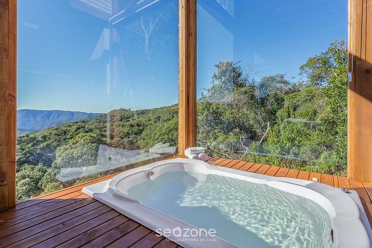 Encantadora cabaña en la montaña c/jacuzzi VST014