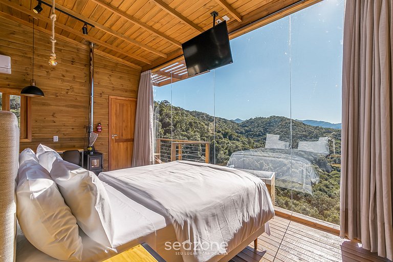 Acogedora cabaña c/jacuzzi en las montañas VST015