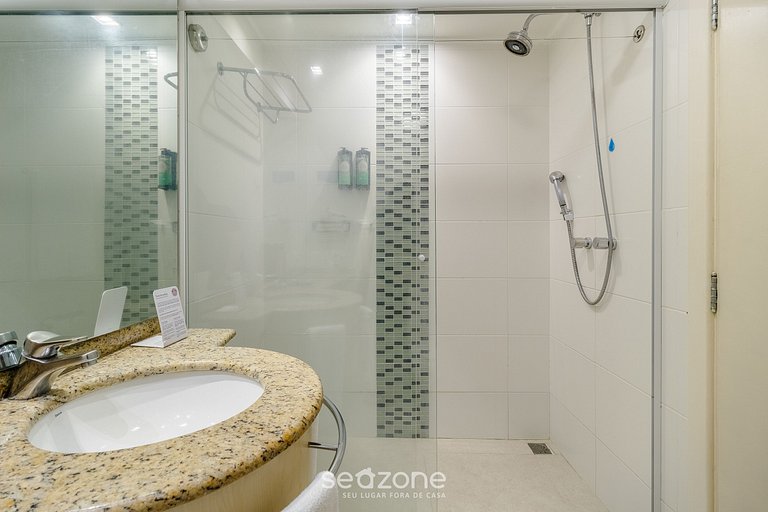 Suíte com bela vista mar/piscina Jurerê JBV248