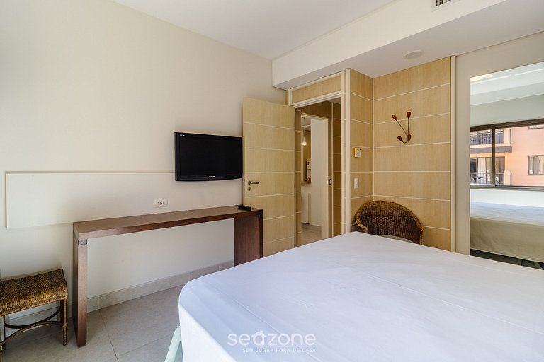 Suíte com bela vista mar/piscina Jurerê JBV248