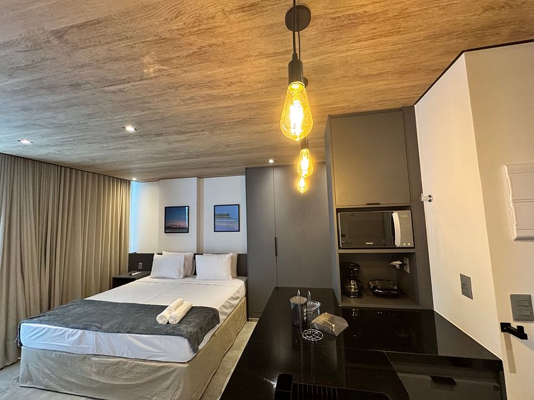 Elegante estúdio com vista lateral p/ mar NWT0907