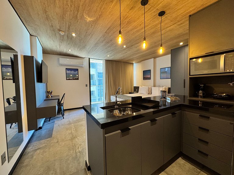 Elegante estúdio com vista lateral p/ mar NWT0907