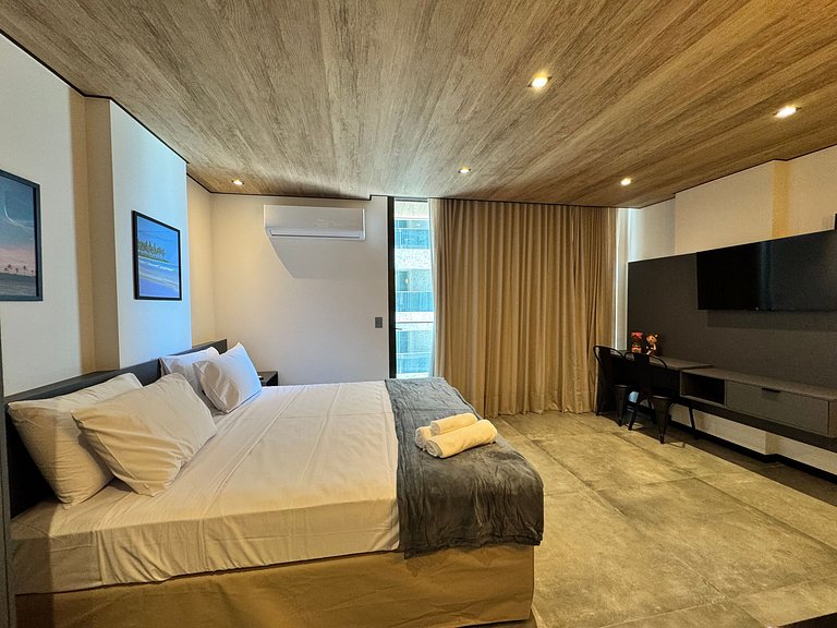 Elegante estúdio com vista lateral p/ mar NWT0907