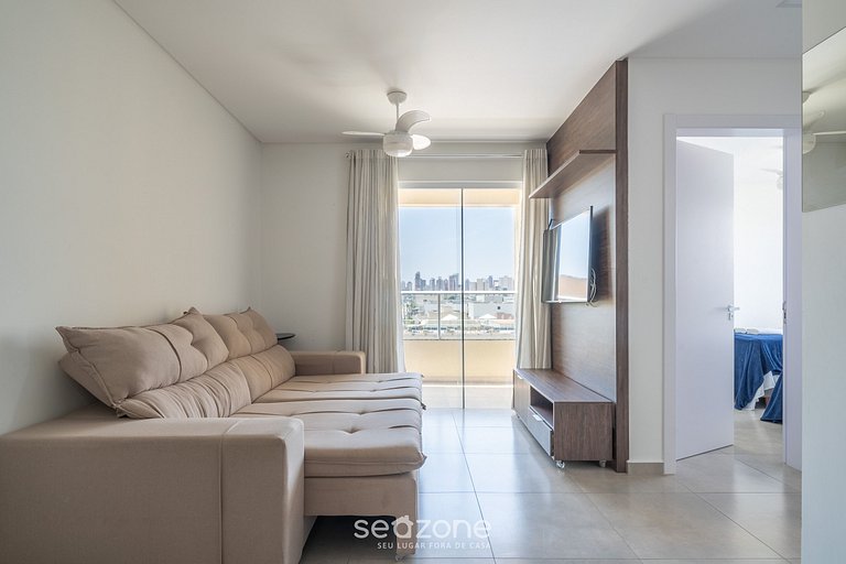 Bom apto c/2 quartos e varanda em Itapema RSN301