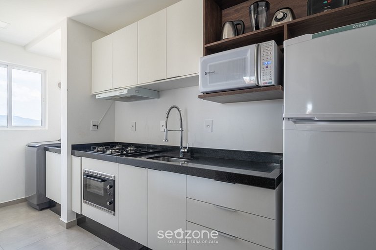 Bom apto c/2 quartos e varanda em Itapema RSN301