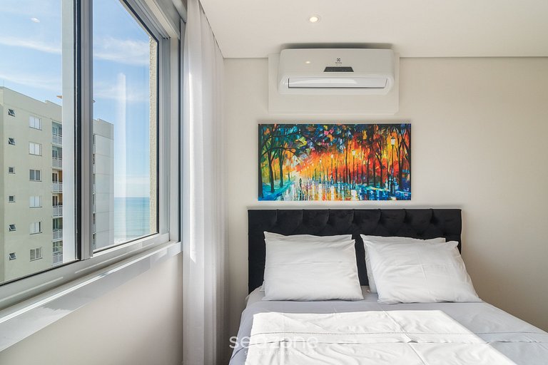 Apto com vista para a praia em Itajuba VAC5604