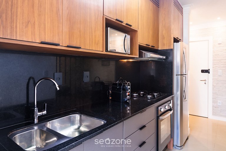 Apto c/ varanda e churrasq. proximo ao Mar GRI1305