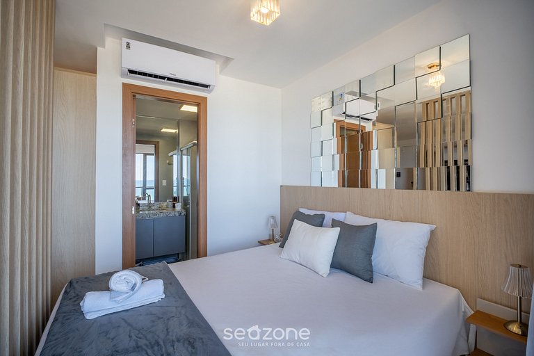 Apto em prédio c/ piscina e vista mar - RGF1211