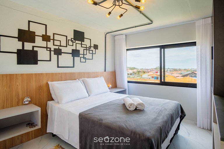 Loft c/ varanda a passos da praia - PLO0009