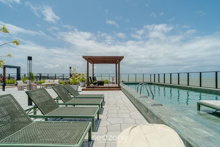 Estudios tipo condominio frente al mar con piscina en la pla