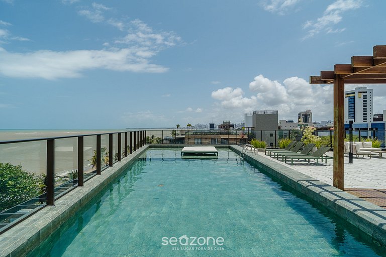 Estudios tipo condominio frente al mar con piscina en la pla