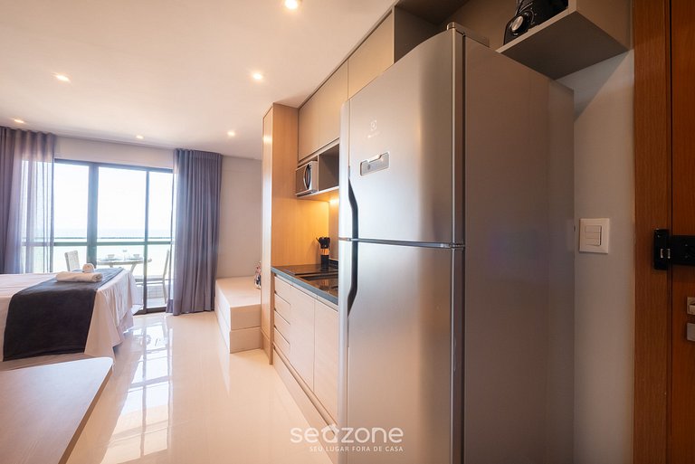 Studio c/ varanda e vista mar em Itapuã RGF1308