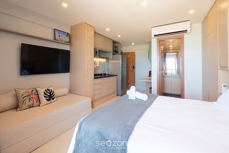 Studio c/ varanda e vista mar em Itapuã RGF1308