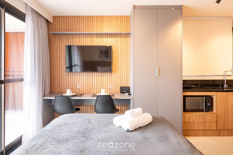 Studio c/ varanda e vista parcial p/ o mar ZNB1604