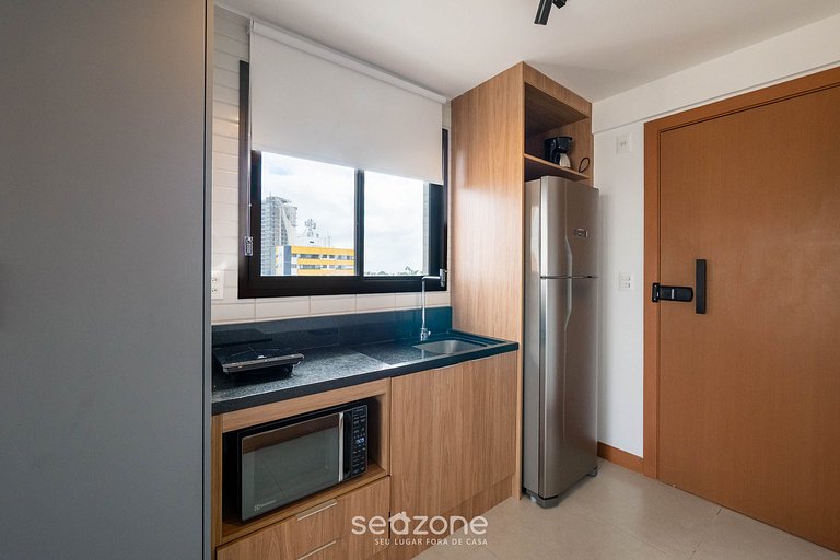 Studio c/ varanda e vista parcial p/ o mar ZNB1604