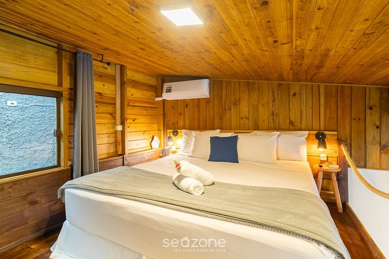 Loft rústico c/ varanda+jardim próx praia NDE0002