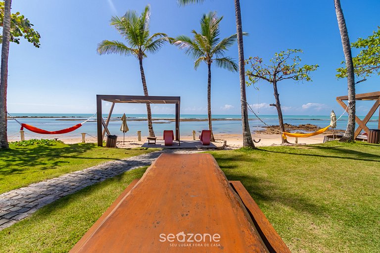 Aptos equipados em condomínio à beira-mar com área de lazer