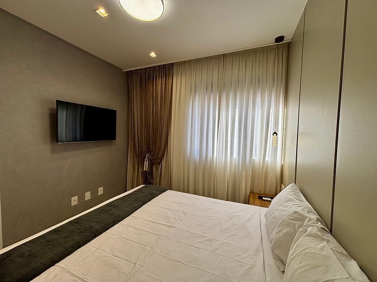 Apto c/ varanda gourmet a 700m da Praia BON1101