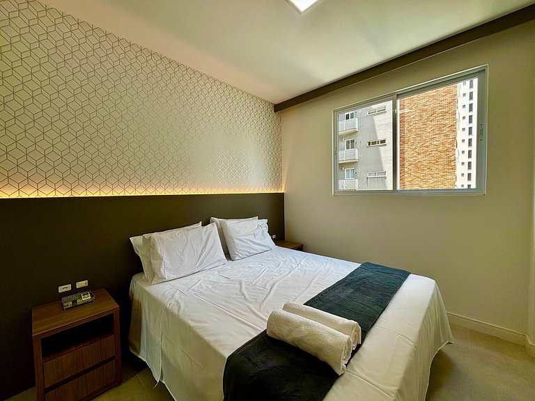 Apto c/ varanda gourmet a 450m da praia REB0802