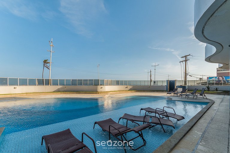 Tu estadía exclusiva en edificio con piscina a pasos del mar