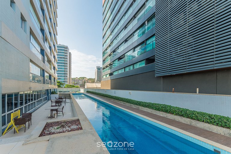 Tu estadía exclusiva en edificio con piscina a pasos del mar