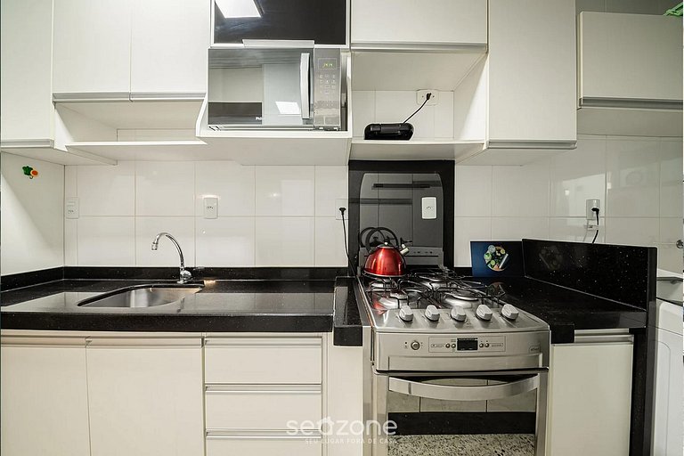 Apto c/varanda a 4min da praia de Bombas COL102