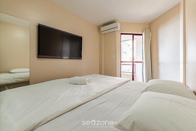 Pie apto en la arena con vista al mar en Meia Praia EVB308