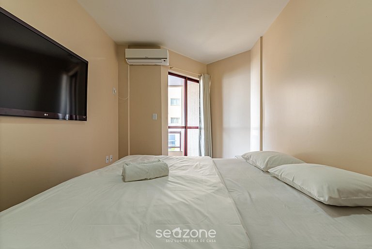 Pie apto en la arena con vista al mar en Meia Praia EVB308