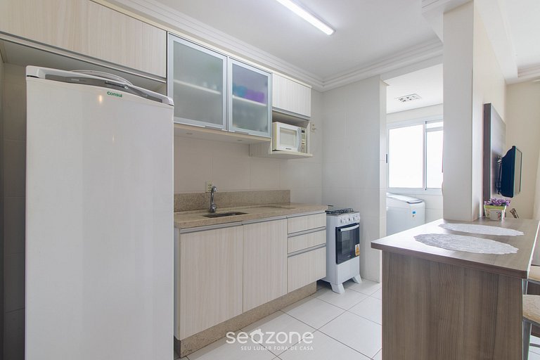 Apto c/ churrasq. e varanda prox. da Praia CGN0306