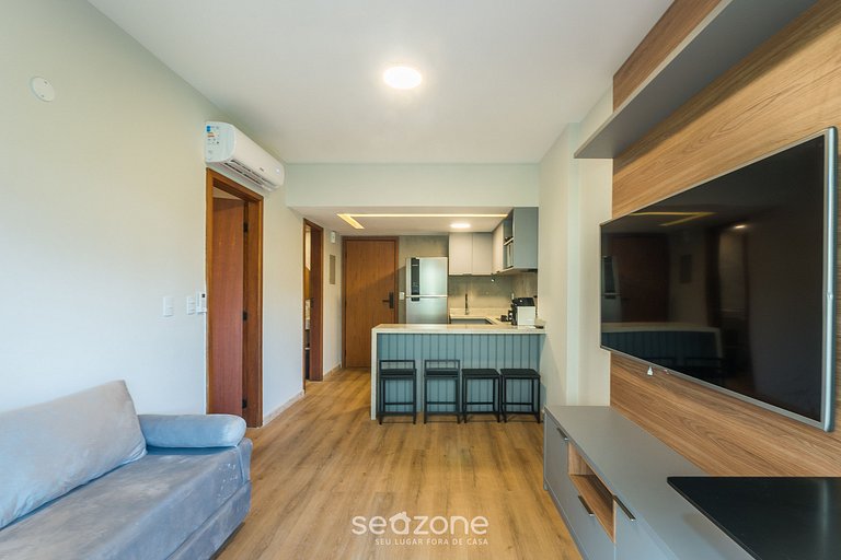 Apto c/ varanda a passos da praia da Barra TLR0113