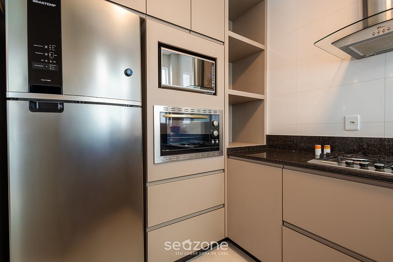 Apto c/ varanda gourmet a 450m da praia REB0802