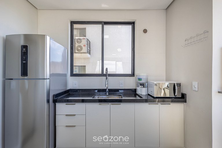 Apto c/ churrasq. e vista mar em Itajubá IBH0201