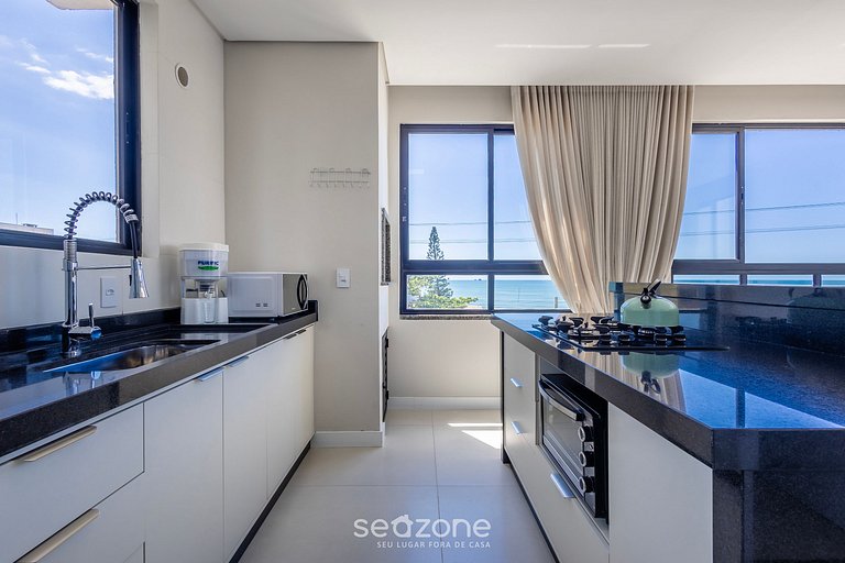 Apto c/ churrasq. e vista mar em Itajubá IBH0201