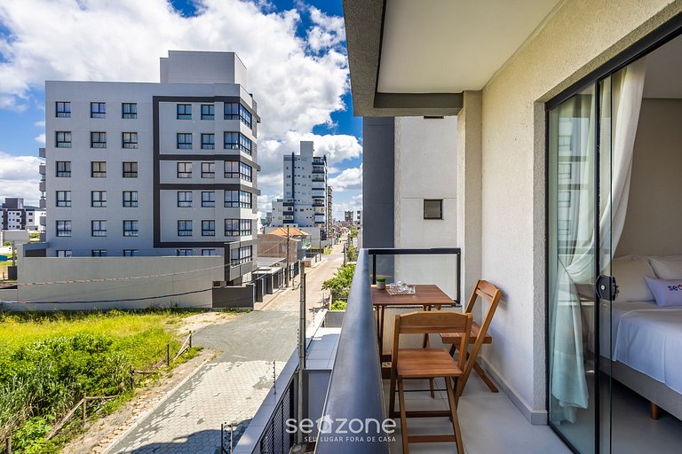 Apto c/ churrasq. e vista mar em Itajubá IBH0201