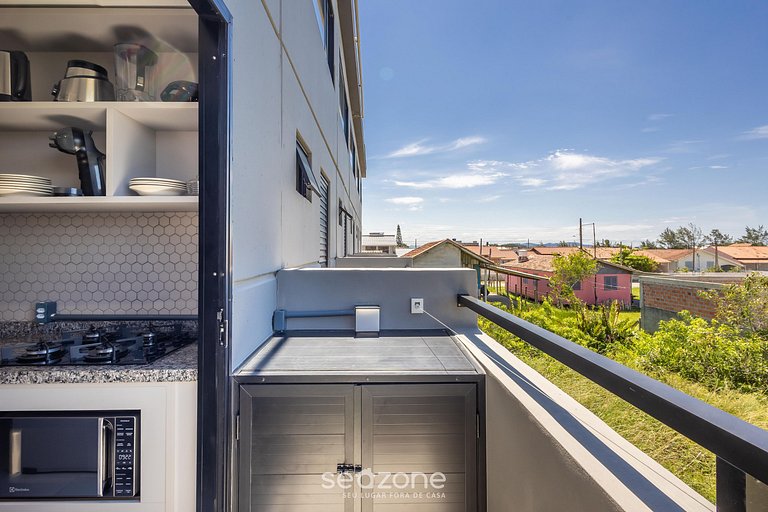 Loft c/ varanda a passos da praia - PLO0009