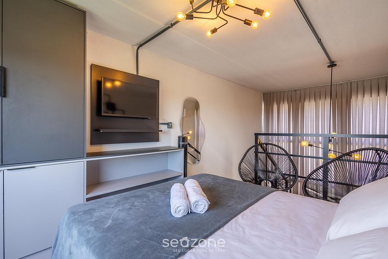 Loft c/ varanda a passos da praia - PLO0009