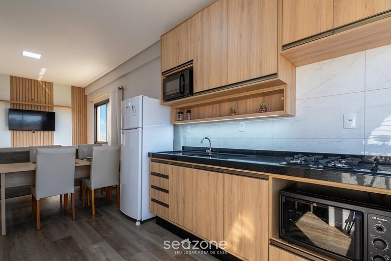 Apto em prédio c/ churrasq. no Centro CTD0402