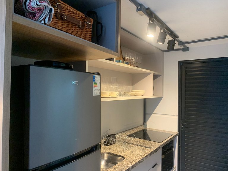 Studio en edificio c/ parrilla centro PLO0003