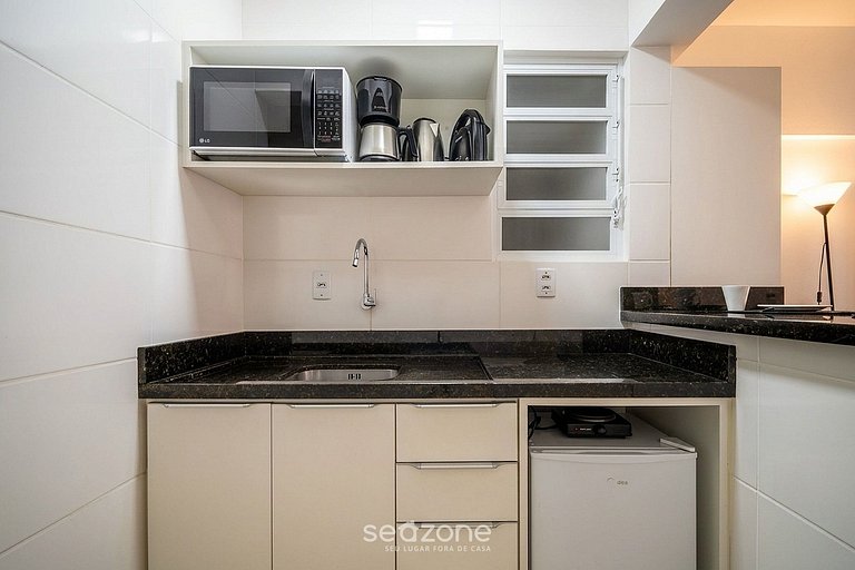 Studio em prédio no Centro c/ Vista DIL0103