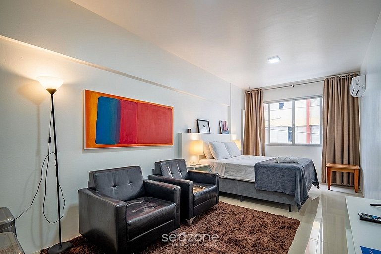 Studio em prédio no Centro c/ Vista DIL0103