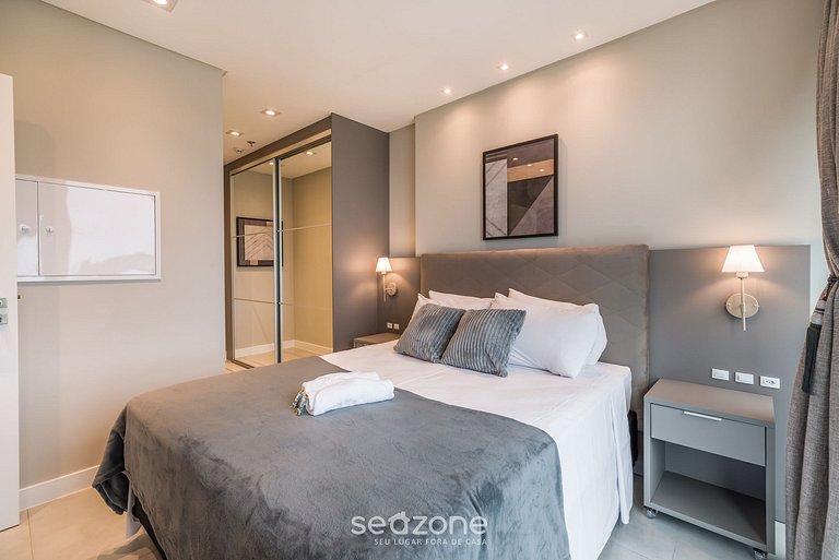 Apartamento contemporâneo em condomínio com vista para o mar