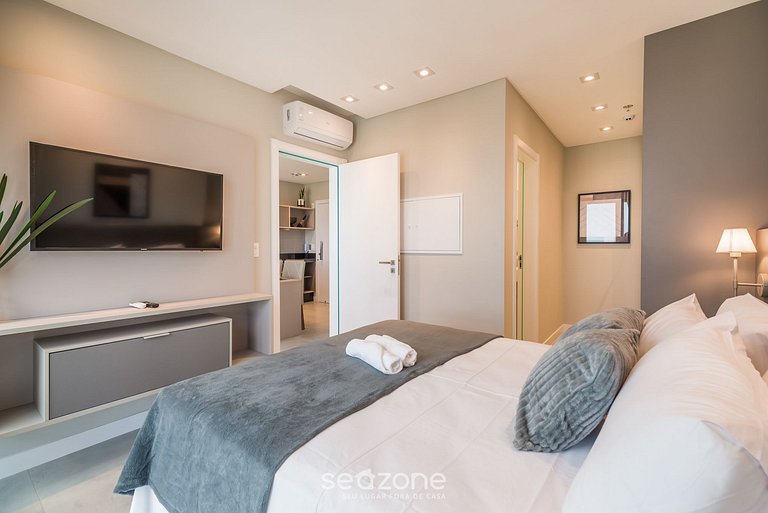 Apartamento contemporâneo em condomínio com vista para o mar