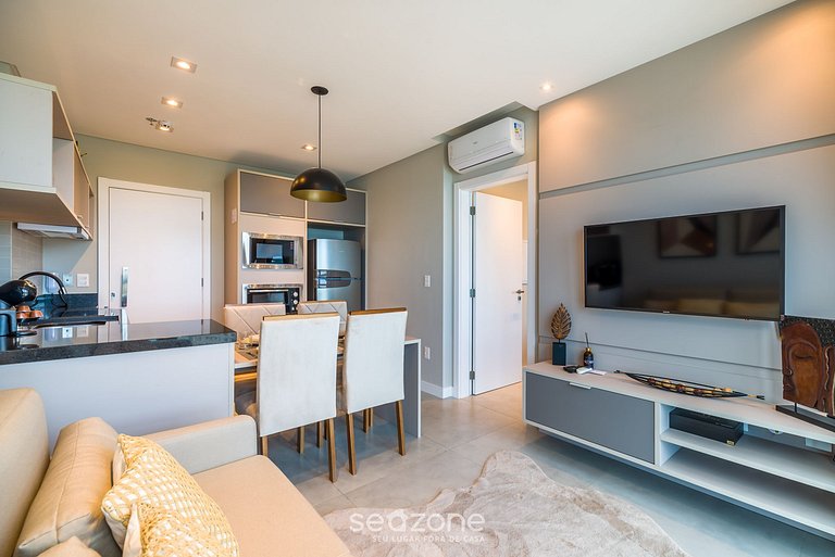 Apartamento contemporâneo em condomínio com vista para o mar