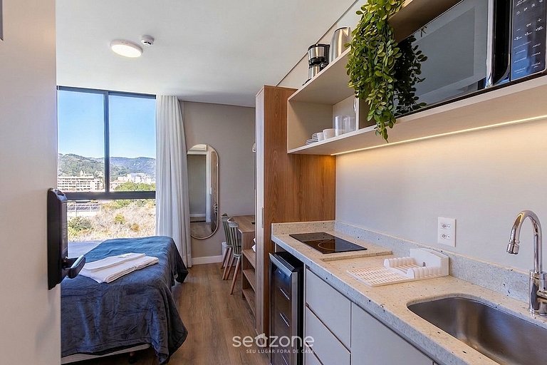 Studio em Cond. c/ Garagem e Vista Cid. UST0508