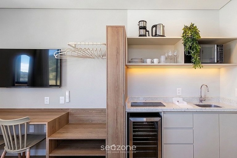 Studio em Cond. c/ Garagem e Vista Cid. UST0508