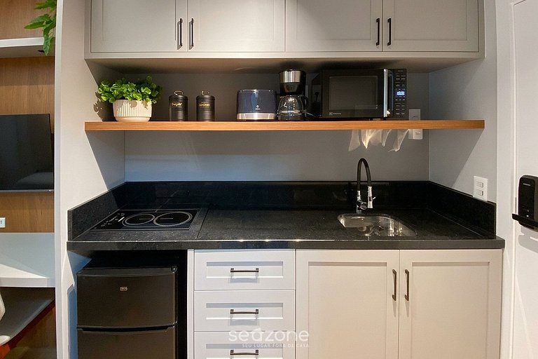Studio c/ Garagem e Vista Cid. UST0504